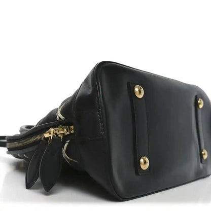 Louis Vuitton Black Lambskin Malletage Alma PM Quilted Handbag - NEESTRA